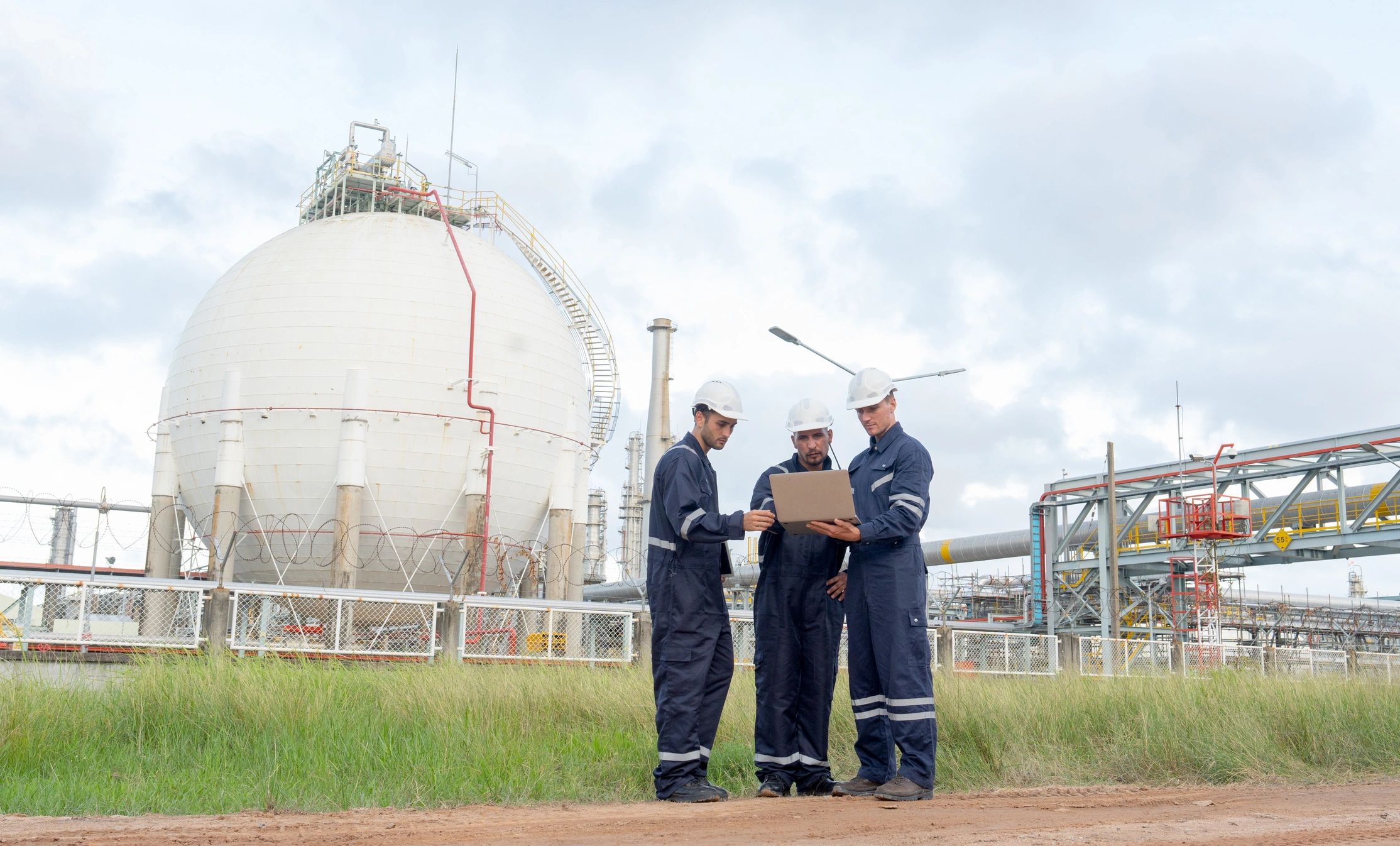 Energy sector team collaborating at an industrial site